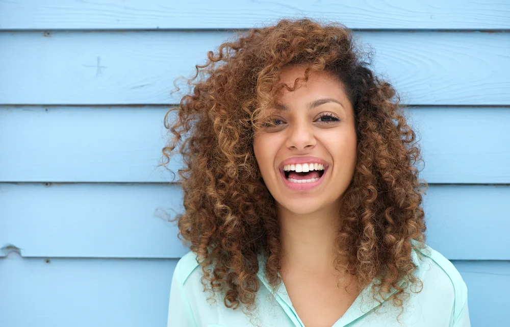 How To Make Curly Hair Grow Down Instead Of Out?