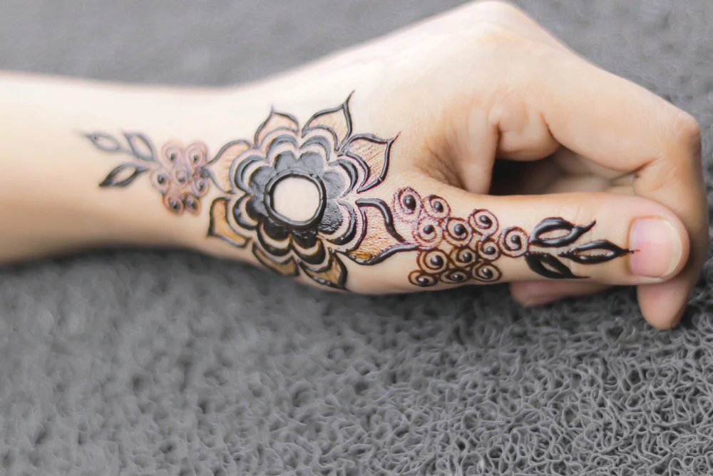 lotus back hand henna design